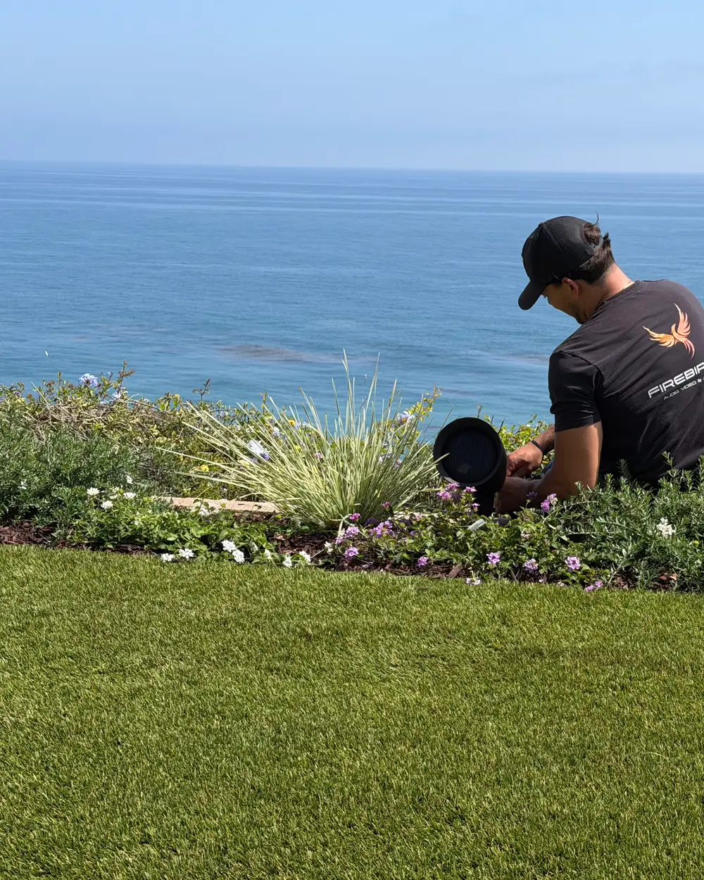 A Firebird Audio Video technician installing landscape audio on a Montecito oceanfront estate