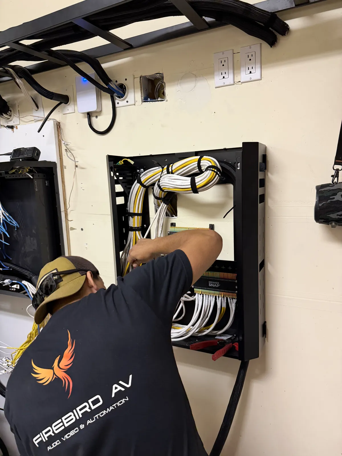 Firebird technician dressing a wall panel